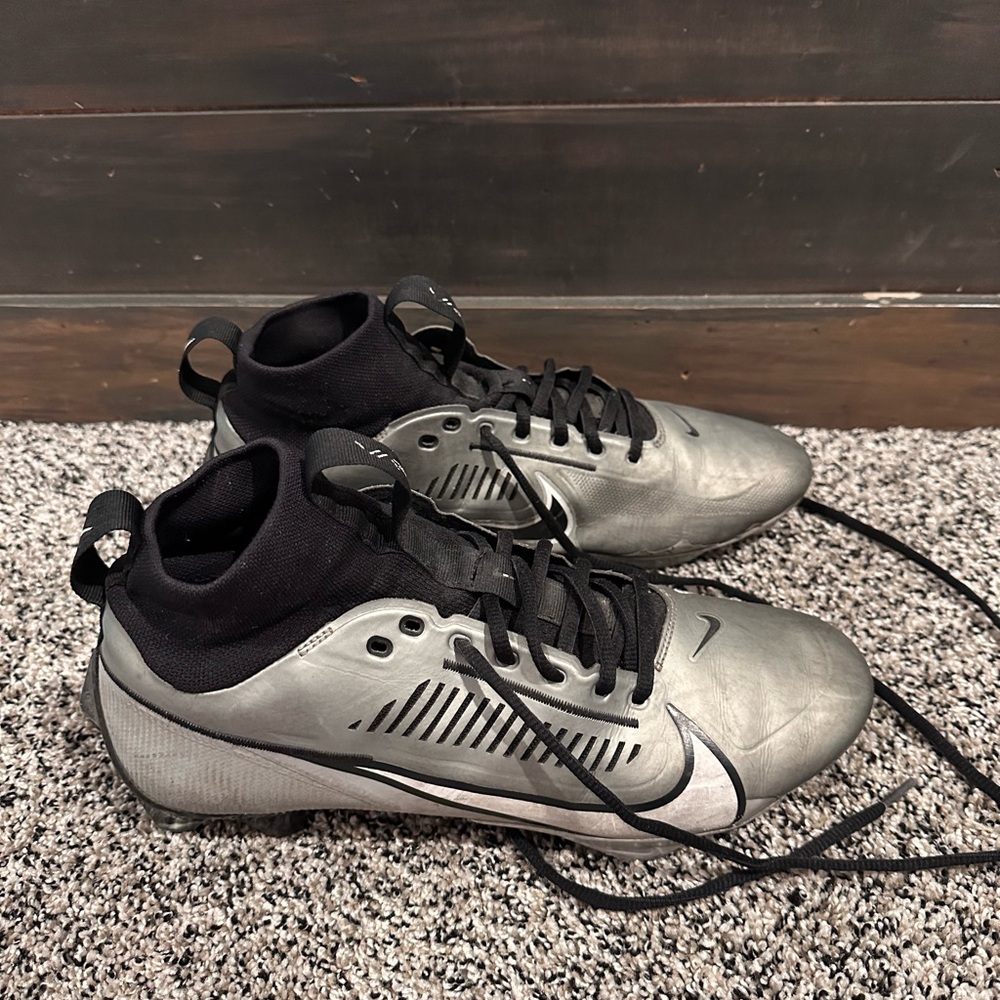 Nike Metallic Silver and Black Cleats